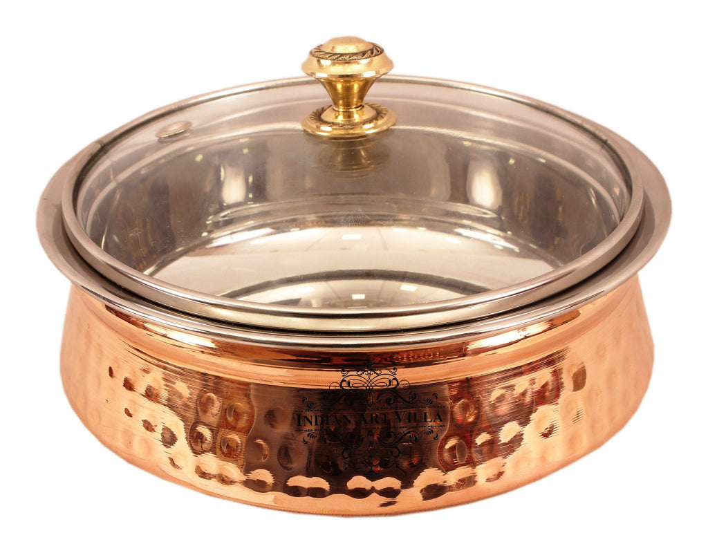 https://www.indianartvilla.com/cdn/shop/products/steel-copper-serving-handi-bowl-with-glass-lid-1350-ml-steel-handi-iav-scb-tw-151-421079_1024x1024.JPG?v=1586629675